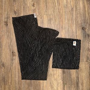 Rubia wear full length black and grey leg warmers